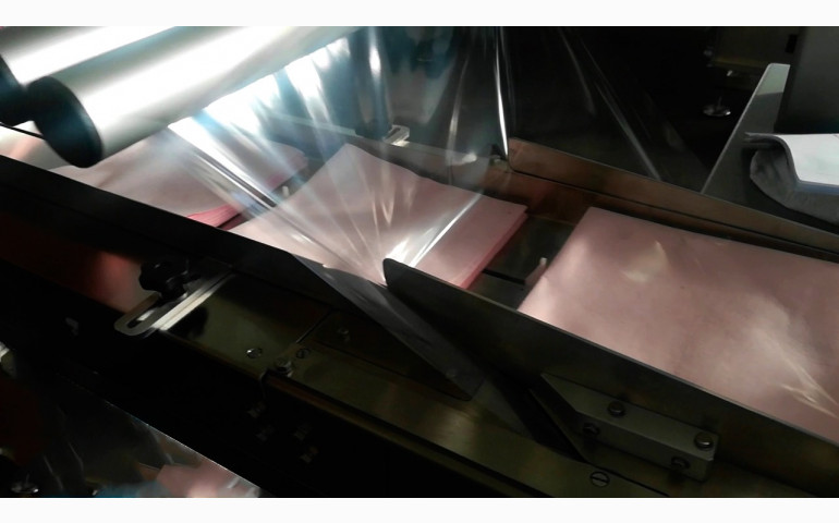 Installation d'une ensacheuse horizontale dans le Pas-De-Calais (62). Emballage de masques et lingettes.