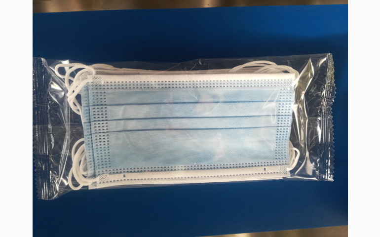 Installation d'une ensacheuse horizontale dans le Pas-De-Calais (62). Emballage de masques et lingettes.