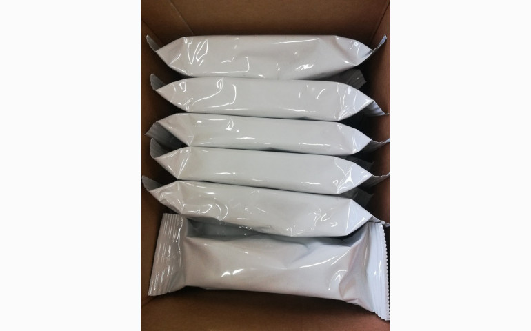 Installation d'une ensacheuse horizontale dans le Rhône (69). Emballage de tests vétérinaires.